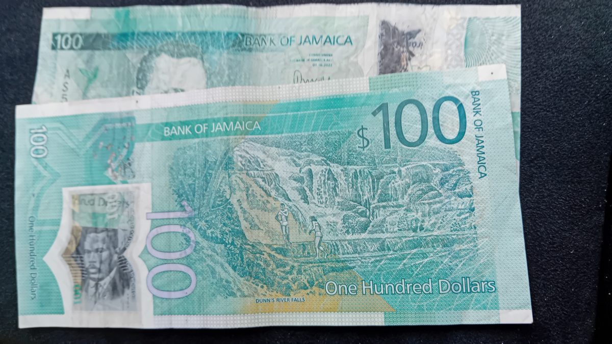 2 Jamaica 100 dollar notes